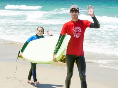 Child learning surf